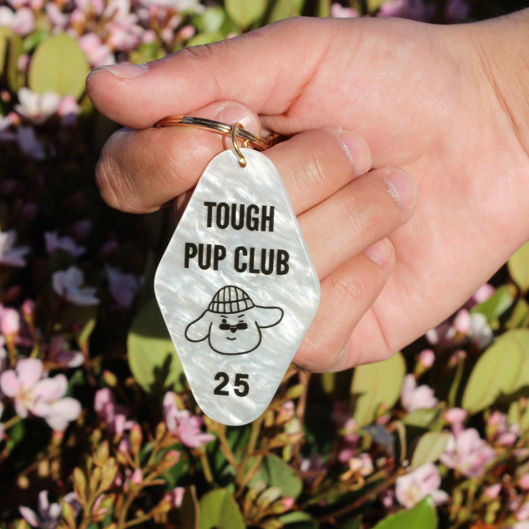 Tough pup Club Hotel keychain